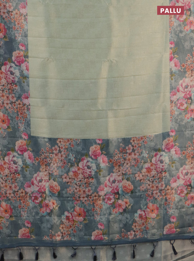 Tissue saree pista green and grey with allover zari weaves and floral digital printed border