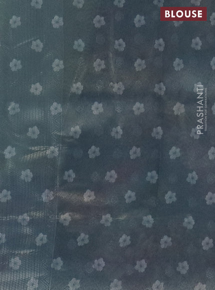 Tissue saree pista green and grey with allover zari weaves and floral digital printed border