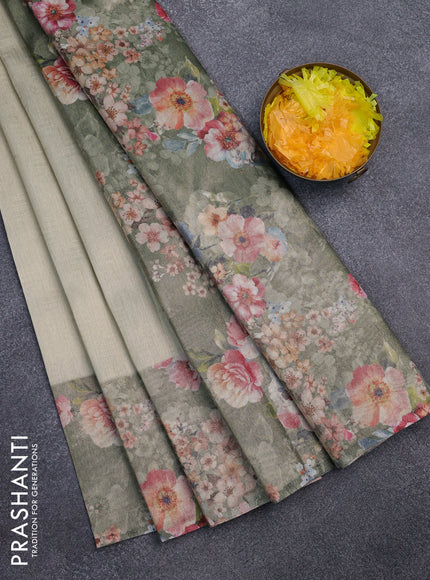Tissue saree pastel pista green and green shade with allover zari weaves and floral digital printed border