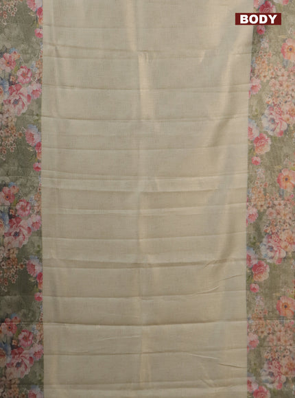 Tissue saree pastel pista green and green shade with allover zari weaves and floral digital printed border