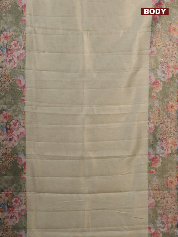Tissue saree pastel pista green and green shade with allover zari weaves and floral digital printed border