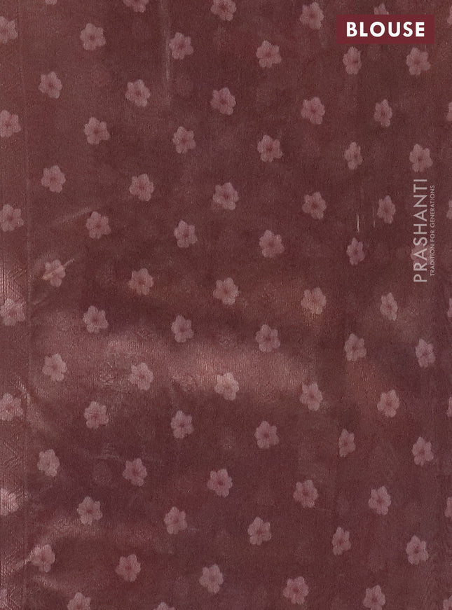Tissue saree sandal and pastel brown with allover zari weaves and floral digital printed border