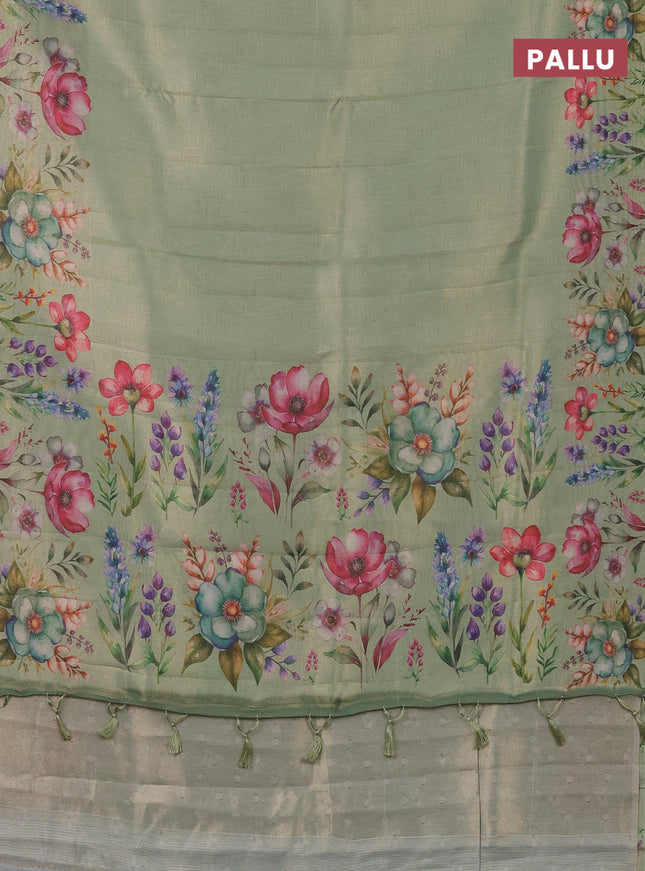 Tissue saree pastel green with allover zari weaves and digital printed border