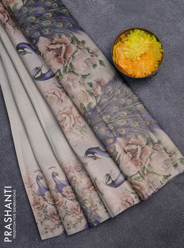 Tissue saree pastel grey and green shade with allover zari weaves and digital printed border