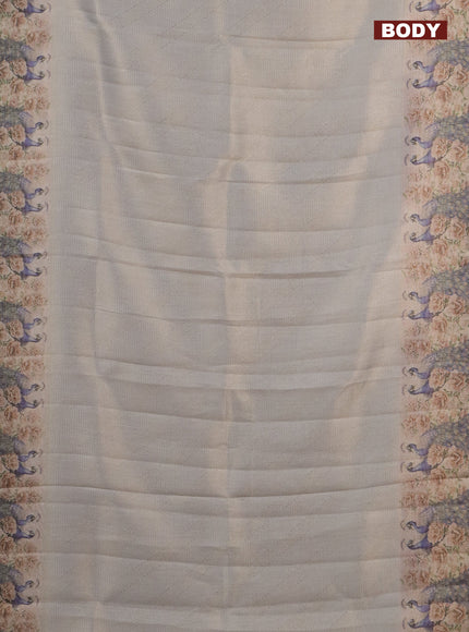 Tissue saree pastel grey and green shade with allover zari weaves and digital printed border