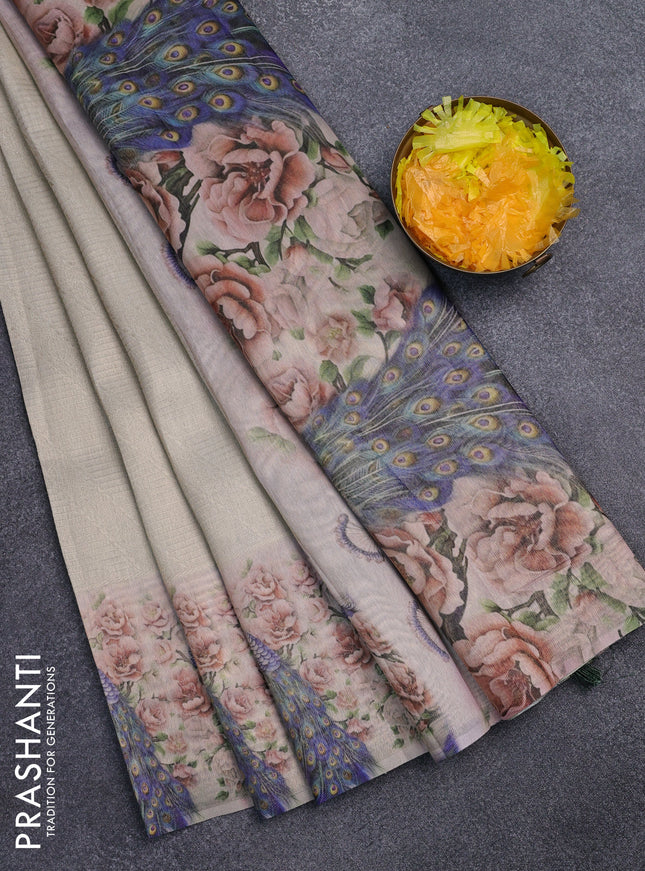 Tissue saree cream and green with allover zari weaves and digital printed border