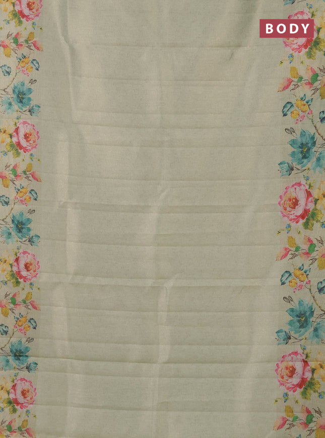 Tissue saree pista green with allover zari weaves and digital printed border