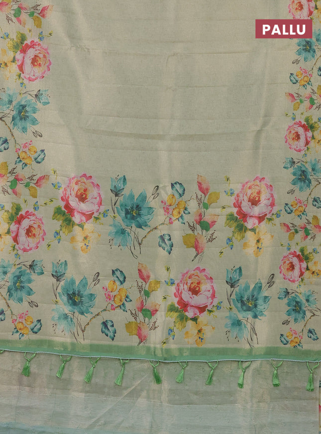 Tissue saree pista green with allover zari weaves and digital printed border