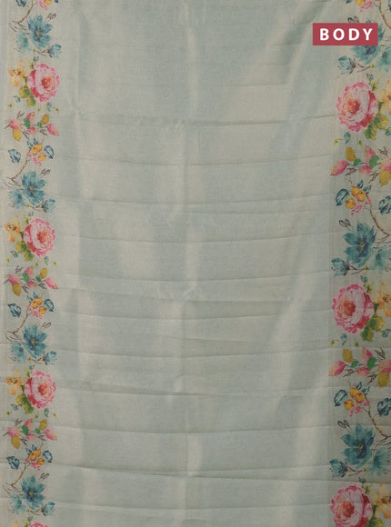 Tissue saree pastel green with allover zari weaves and digital printed border