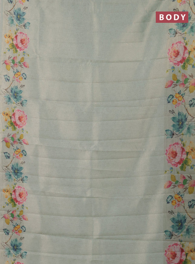 Tissue saree pastel green with allover zari weaves and digital printed border