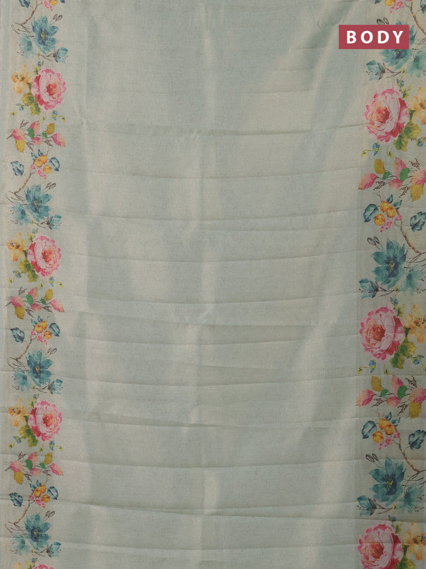 Tissue saree pastel green with allover zari weaves and digital printed border