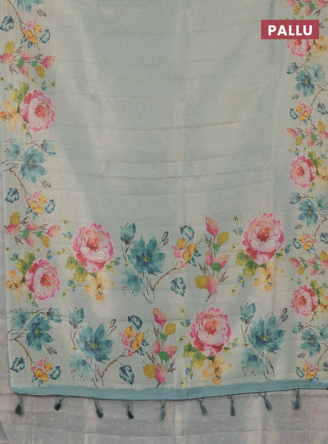 Tissue saree pastel green with allover zari weaves and digital printed border