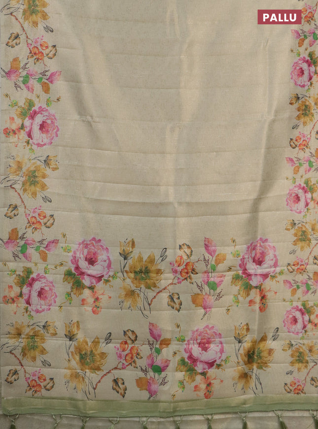 Tissue saree cream and pastel green with allover zari weaves and digital printed border