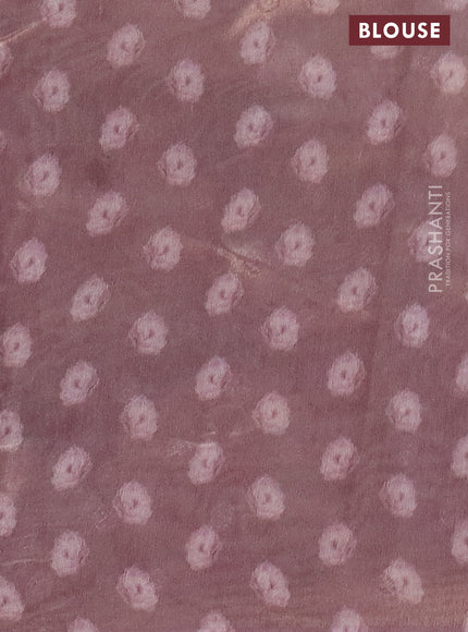 Tissue saree cream and pastel pink with allover zari weaves and floral digital printed border