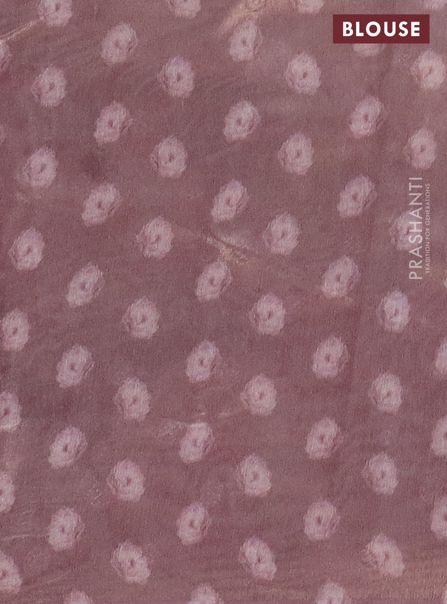 Tissue saree cream and pastel pink with allover zari weaves and floral digital printed border