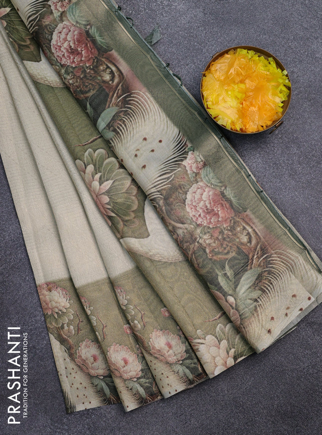 Tissue saree cream and sap green with allover zari weaves and floral digital printed border