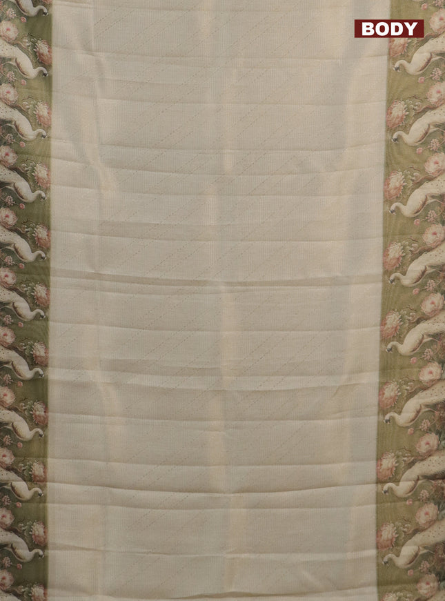 Tissue saree cream and sap green with allover zari weaves and floral digital printed border