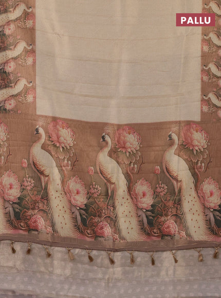 Tissue saree cream and peach shade with allover zari weaves and floral digital printed border