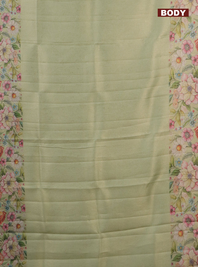 Tissue saree pista green with allover zari weaves and floral digital printed border