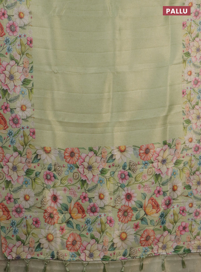 Tissue saree pista green with allover zari weaves and floral digital printed border