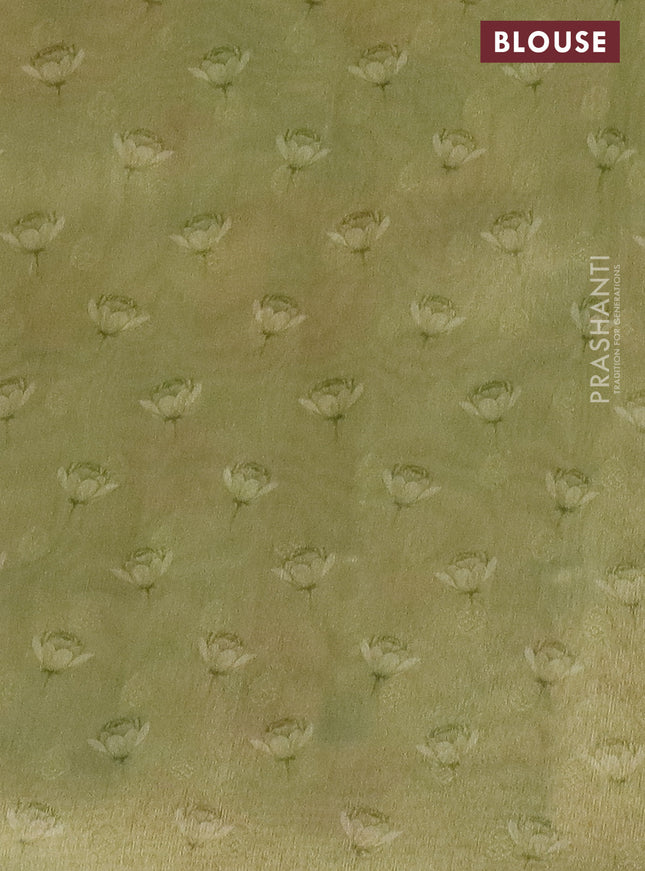 Tissue saree pista green with allover zari weaves and floral digital printed border