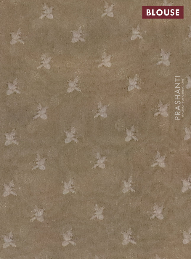 Tissue saree dark beige with allover zari weaves and floral digital printed border