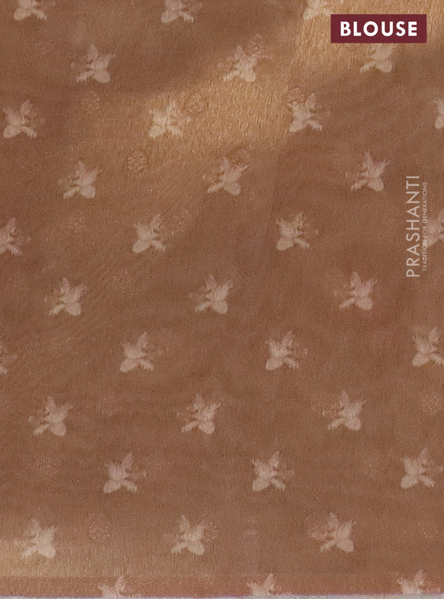 Tissue saree sandal with allover zari weaves and floral digital printed border