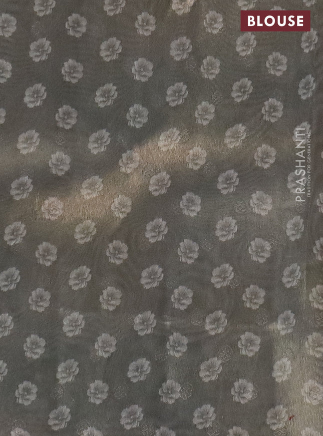 Tissue saree pastel grey with allover zari weaves and floral digital printed border