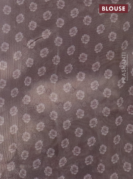 Tissue saree pastel lavender with allover zari weaves and floral digital printed border