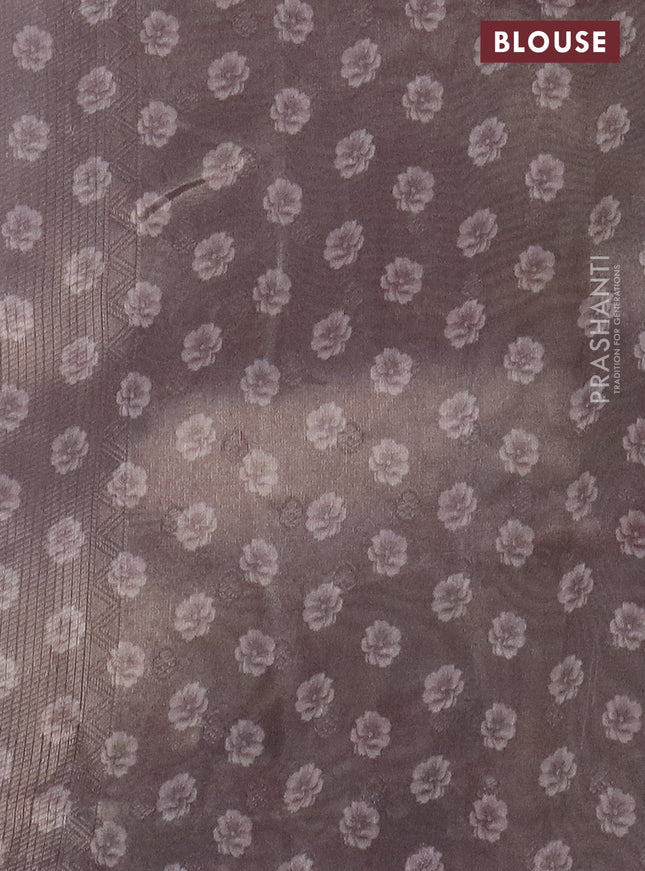 Tissue saree pastel lavender with allover zari weaves and floral digital printed border