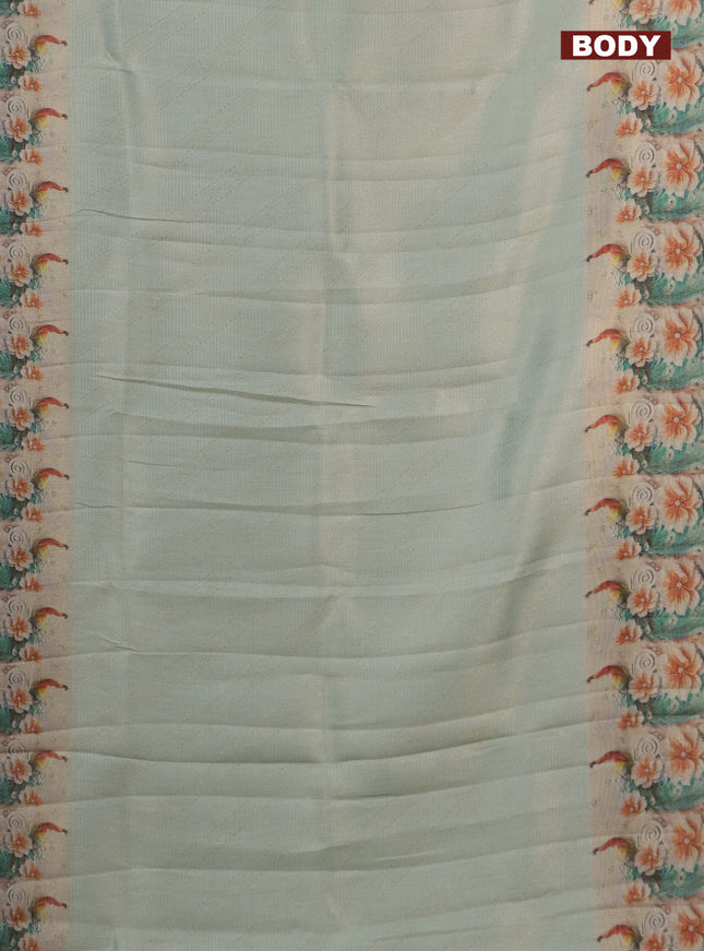 Tissue saree pastel green with allover zari weaves and floral digital printed border