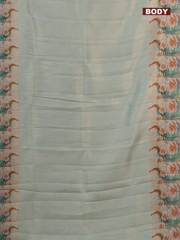 Tissue saree pastel green with allover zari weaves and floral digital printed border
