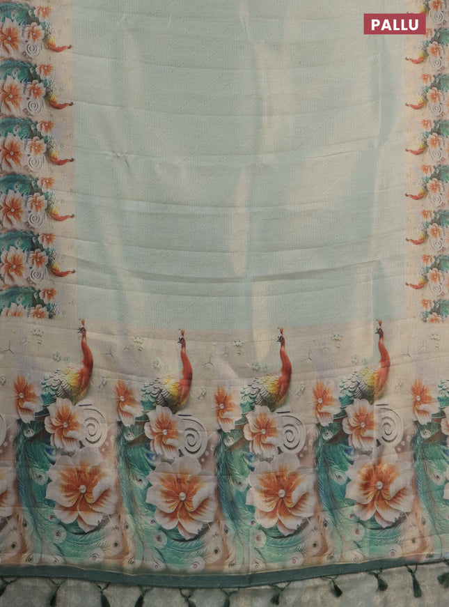Tissue saree pastel green with allover zari weaves and floral digital printed border