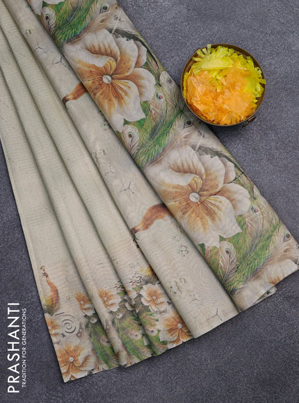 Tissue saree cream with allover zari weaves and floral digital printed border