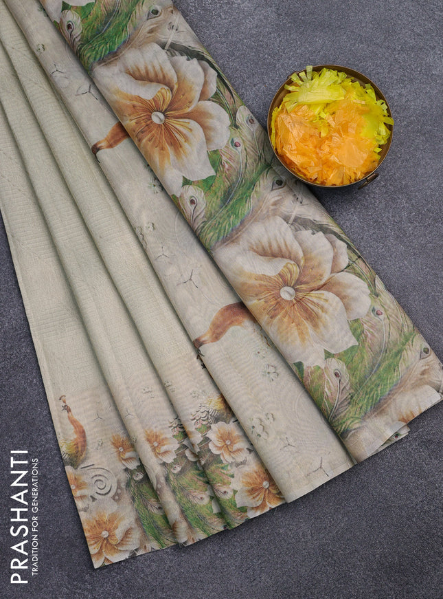 Tissue saree cream with allover zari weaves and floral digital printed border