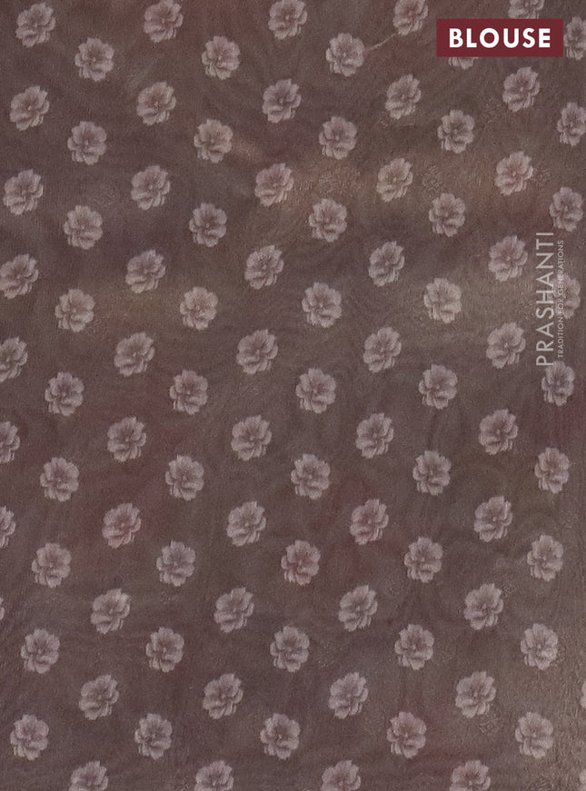 Tissue saree beige with allover zari weaves and floral digital printed border