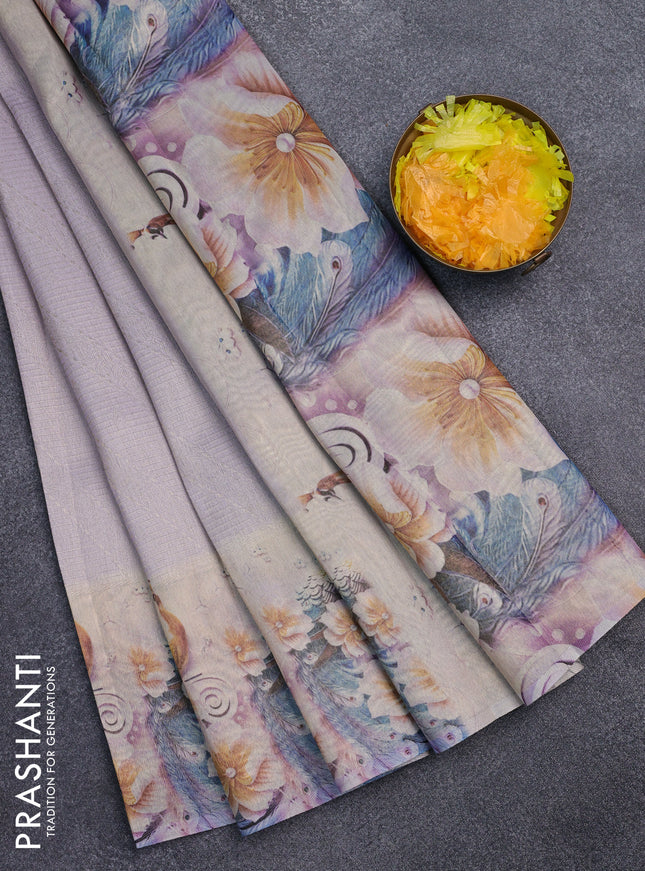Tissue saree pastel lavender with allover zari weaves and floral digital printed border