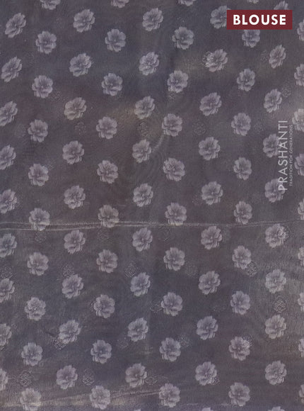 Tissue saree pastel lavender with allover zari weaves and floral digital printed border