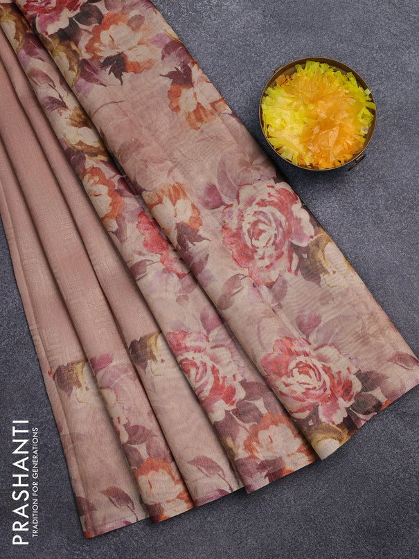 Tissue saree pastel peach with allover zari weaves and floral digital printed border
