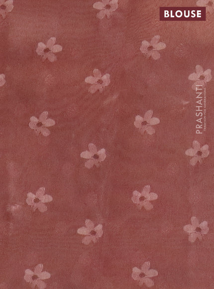 Tissue saree pastel peach with allover zari weaves and floral digital printed border