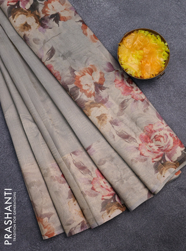 Tissue saree pastel grey with allover zari weaves and floral digital printed border