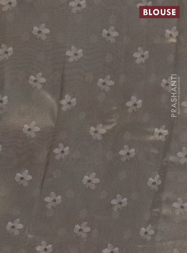 Tissue saree pastel grey with allover zari weaves and floral digital printed border