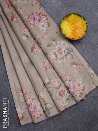 Tissue saree beige with allover zari weaves and floral digital printed border