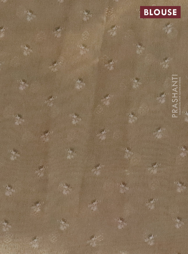 Tissue saree beige with allover zari weaves and floral digital printed border