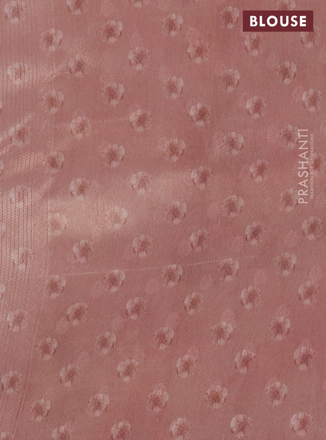 Tissue saree mild peach with allover zari weaves and floral digital printed border