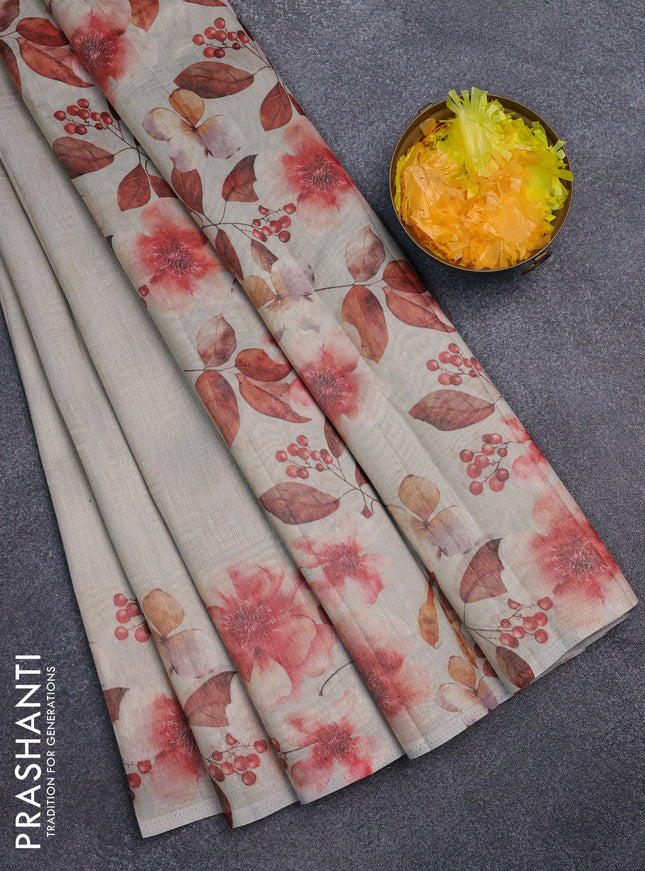 Tissue saree beige and pastel grey with allover zari weaves and floral digital printed border