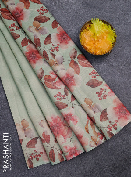 Tissue saree pista green with allover zari weaves and floral digital printed border