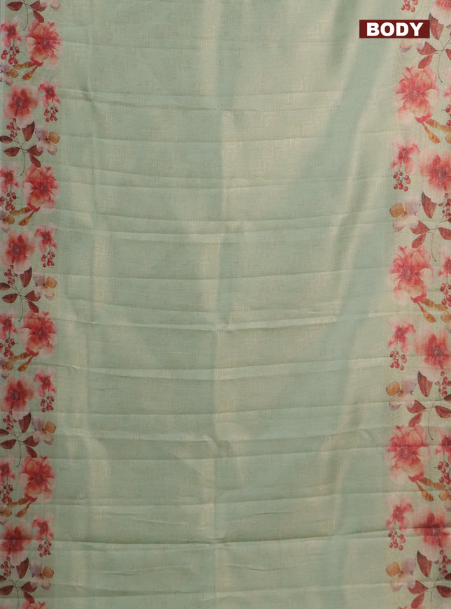 Tissue saree pista green with allover zari weaves and floral digital printed border