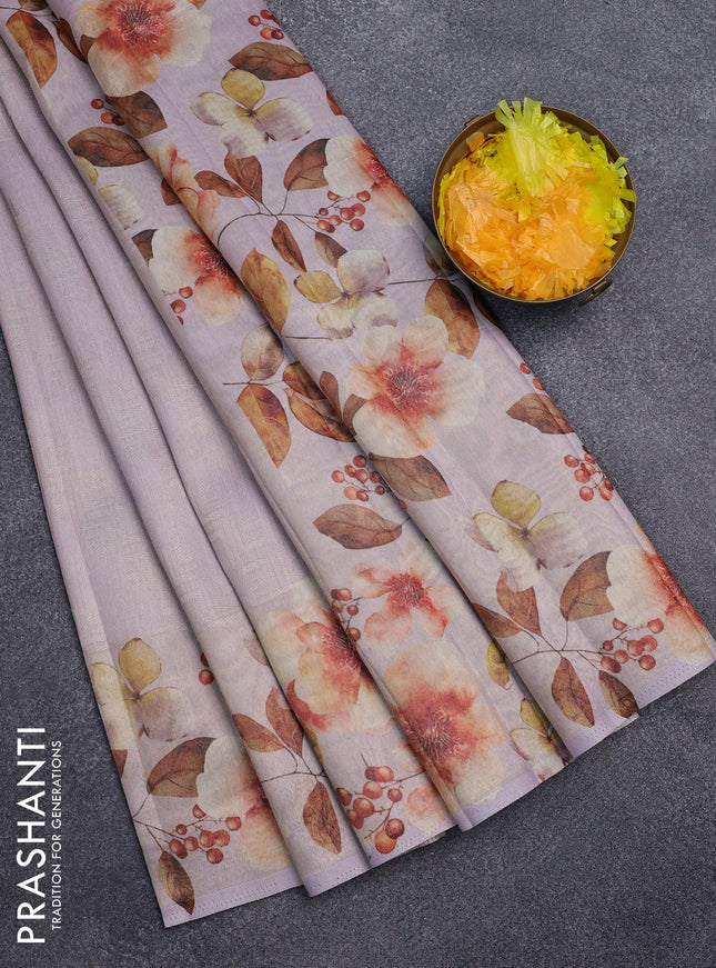 Tissue saree mild lavender with allover zari weaves and floral digital printed border
