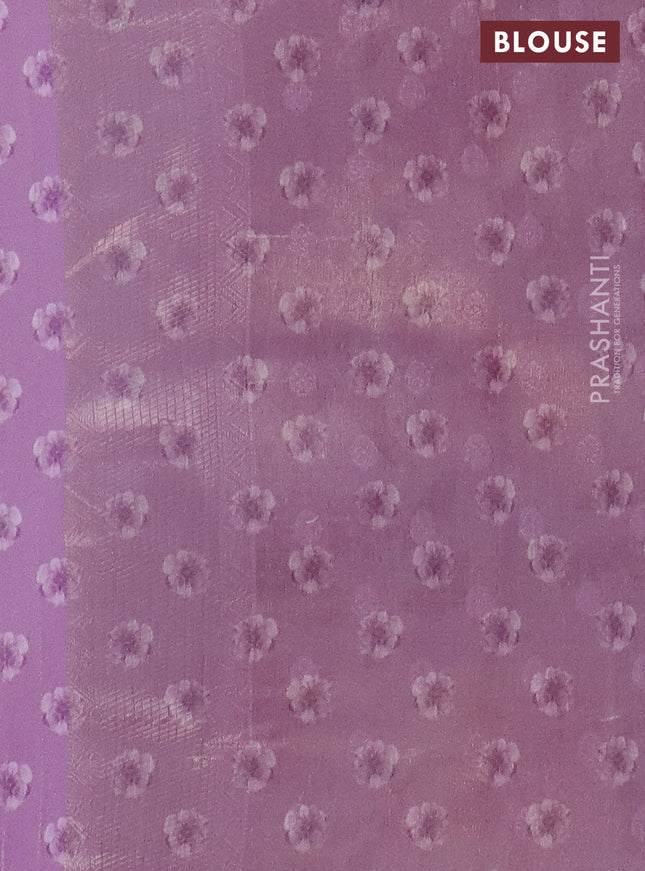 Tissue saree mild lavender with allover zari weaves and floral digital printed border
